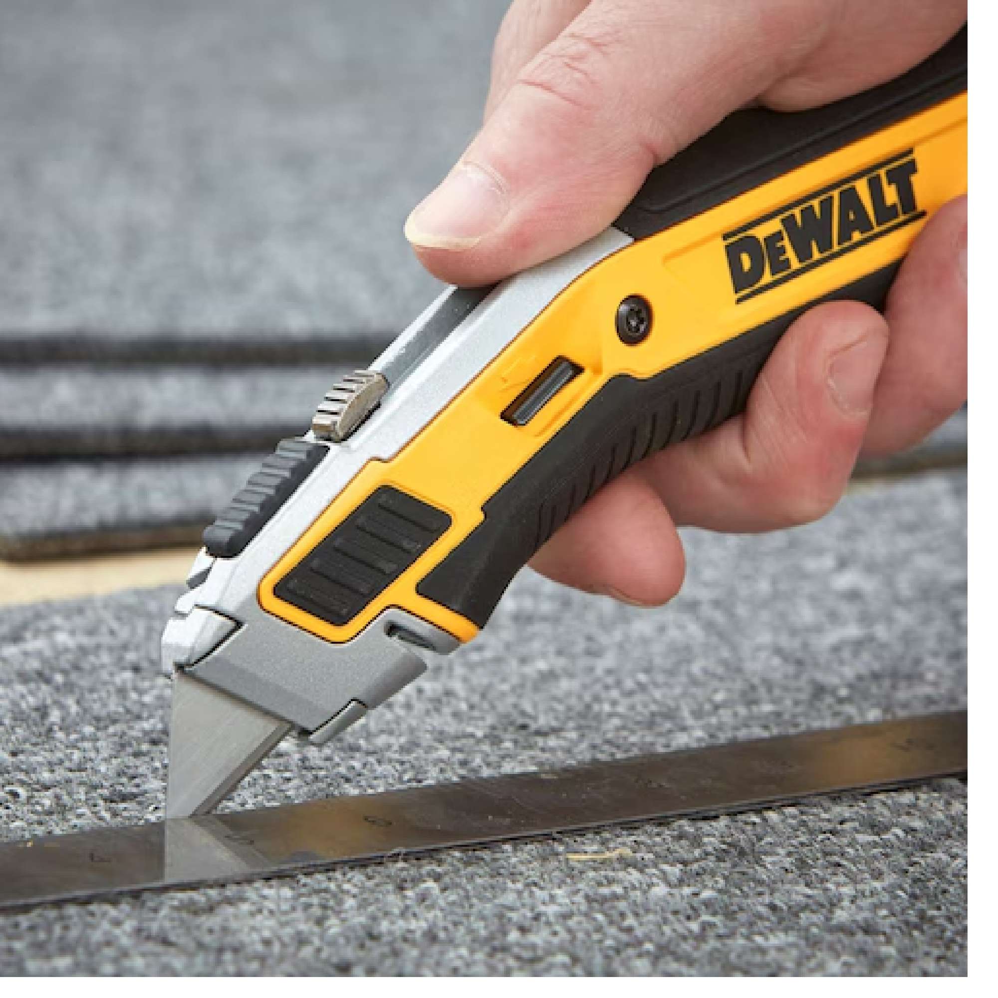 Cutter Premium a lama retrattile con serbatoio e 5 lame - Dewalt DWHT0-10295